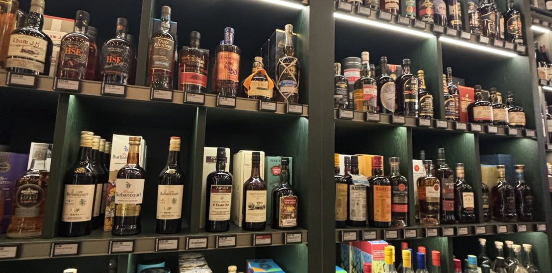 Store shelves stocked with a huge selection of rum