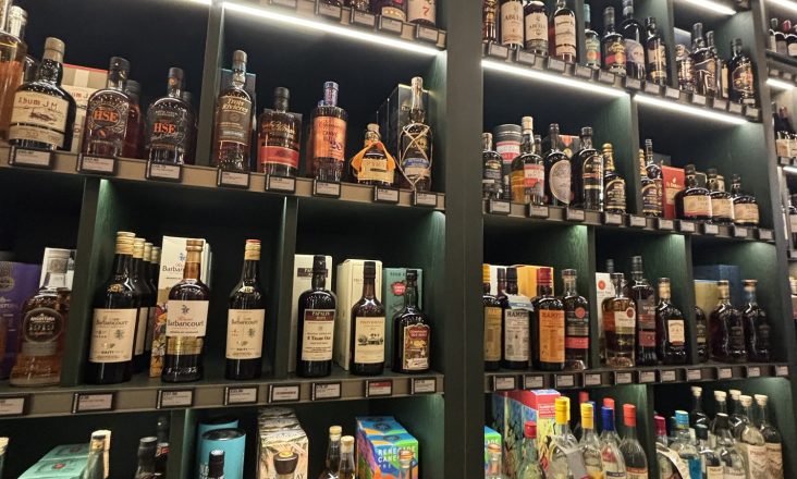 Store shelves stocked with a huge selection of rum