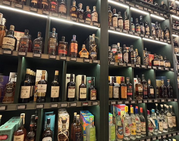 Store shelves stocked with a huge selection of rum