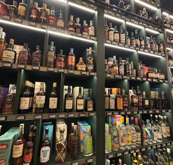 Store shelves stocked with a huge selection of rum